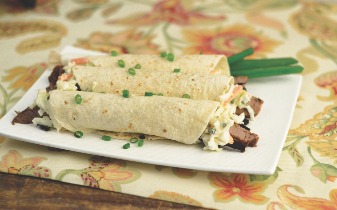 BAJA STEAK TACOS WITH GRILLED SPRING ONIONS AND JALAPENO SLAW