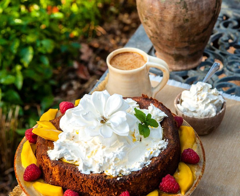 Olive Oil Cake with mango cream and raspberries